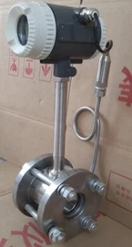Flange mounted vortex flowmeter with temperature and pressure compensation Flange mounted vortex flowmeter with temperature and pressure compensation